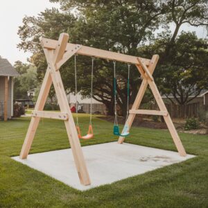 swing set playground in backyard